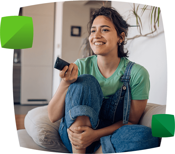 Woman using TV remote