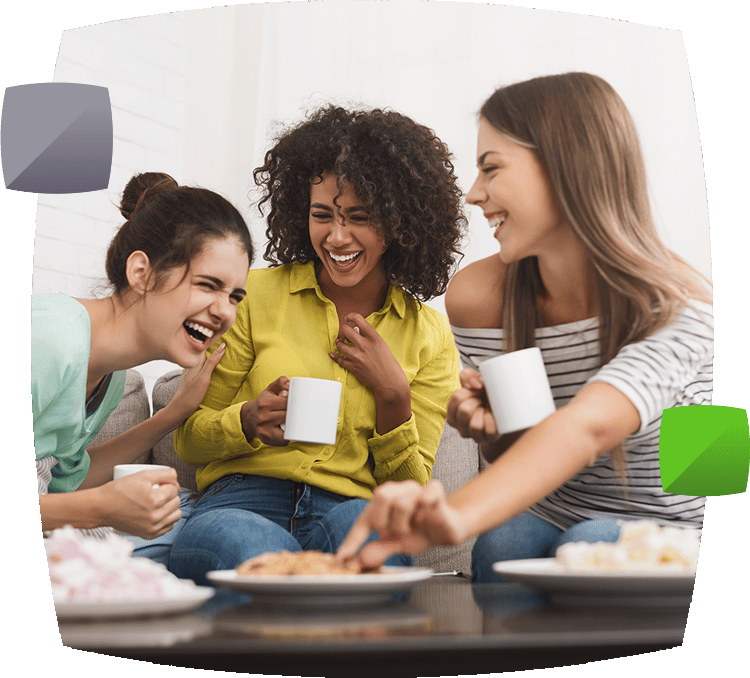 Women enjoying biscuits and cake