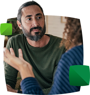 man talking to woman